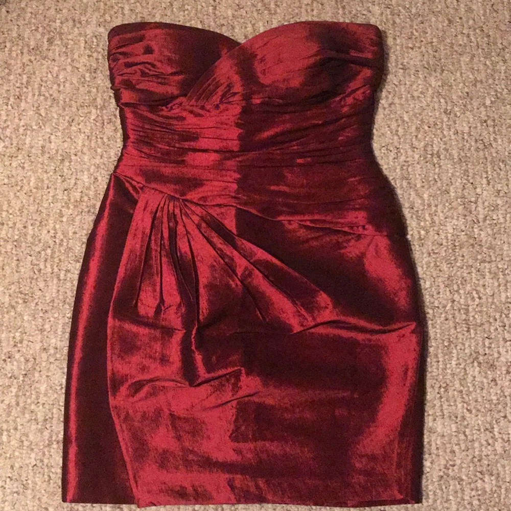 A sheer red Calvin Klein mini-dress